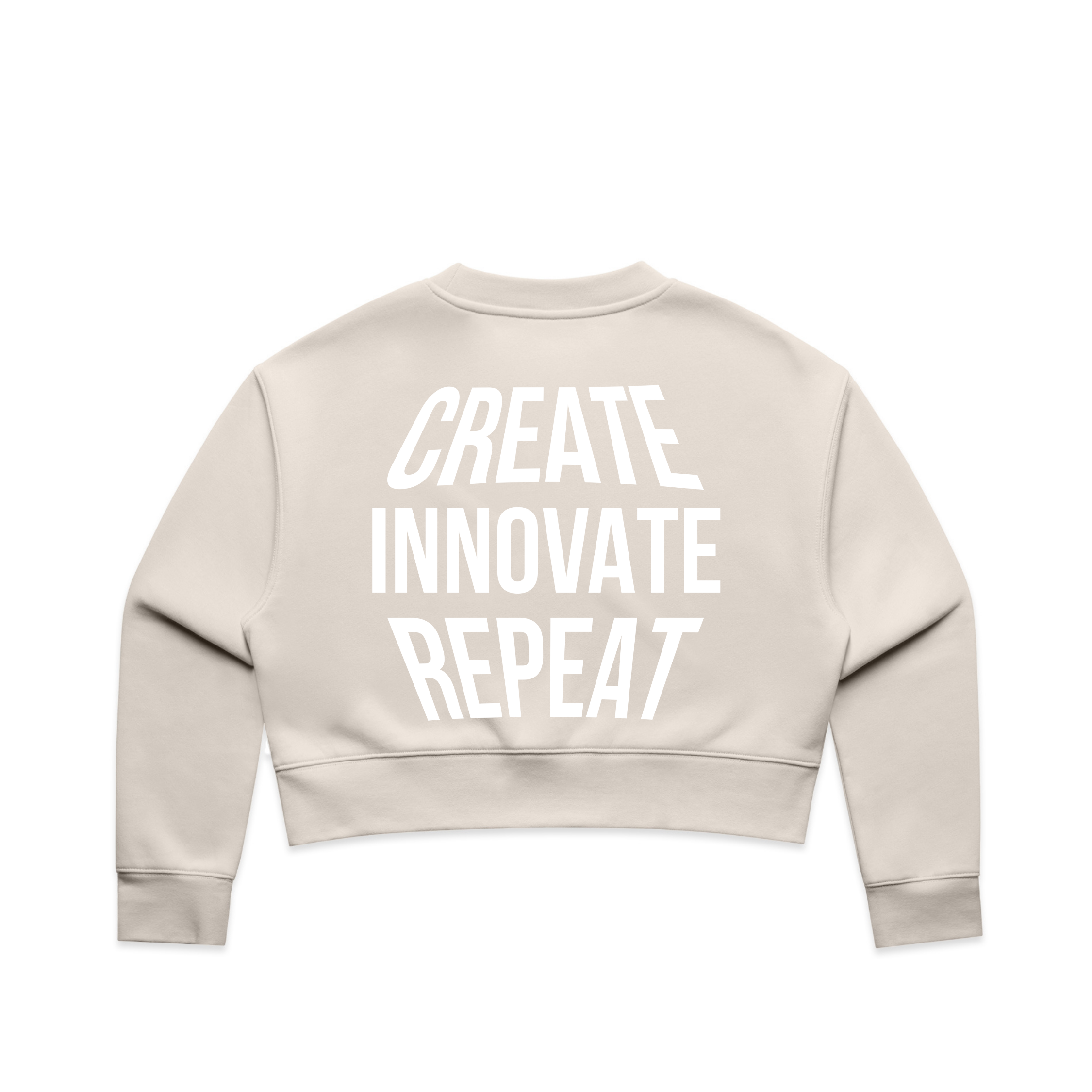 Bone colored sweatshirt with 'CREATE INNOVATE REPEAT' text on the back against a white background